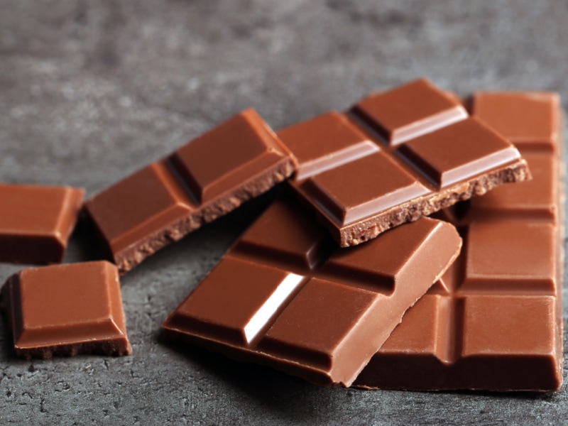 Milk Chocolate Tablets on Gray Background