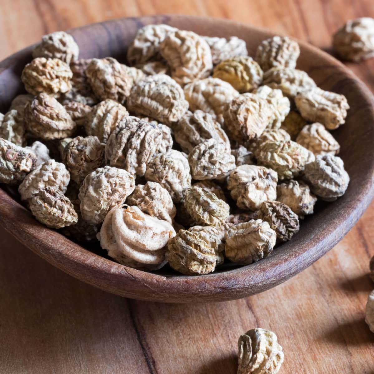 Dried Nasturtium Seeds on a Clay Dish