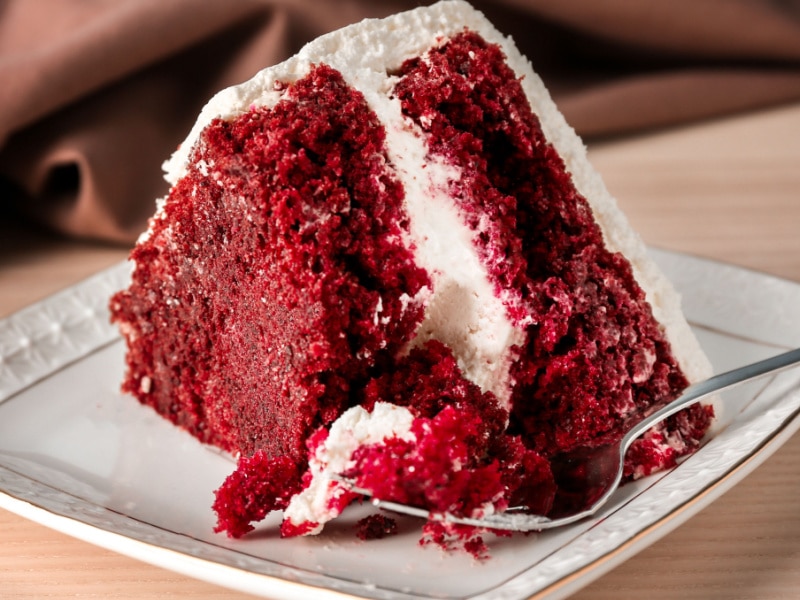 A Sliced of Red Velvet Cake on a Saucer