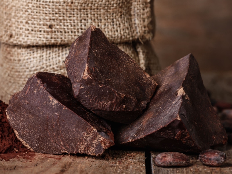 Blocks of Unsweetened Chocolate on a Wooden Table