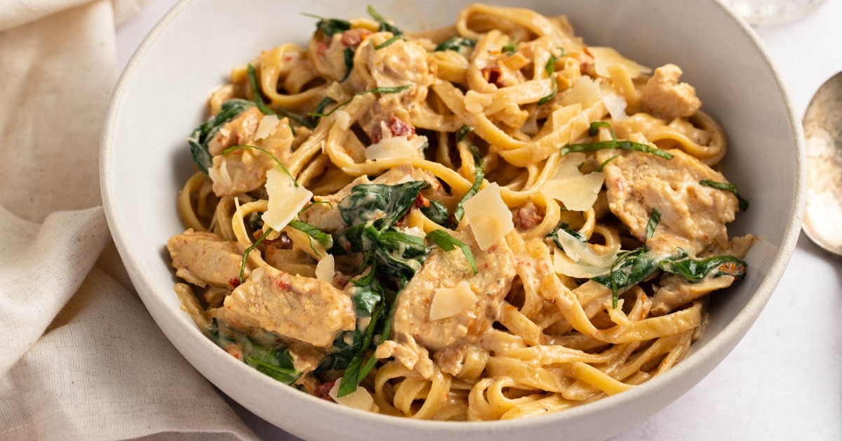 Bowl of Homemade Creamy Chicken Florentine Pasta with Spinach