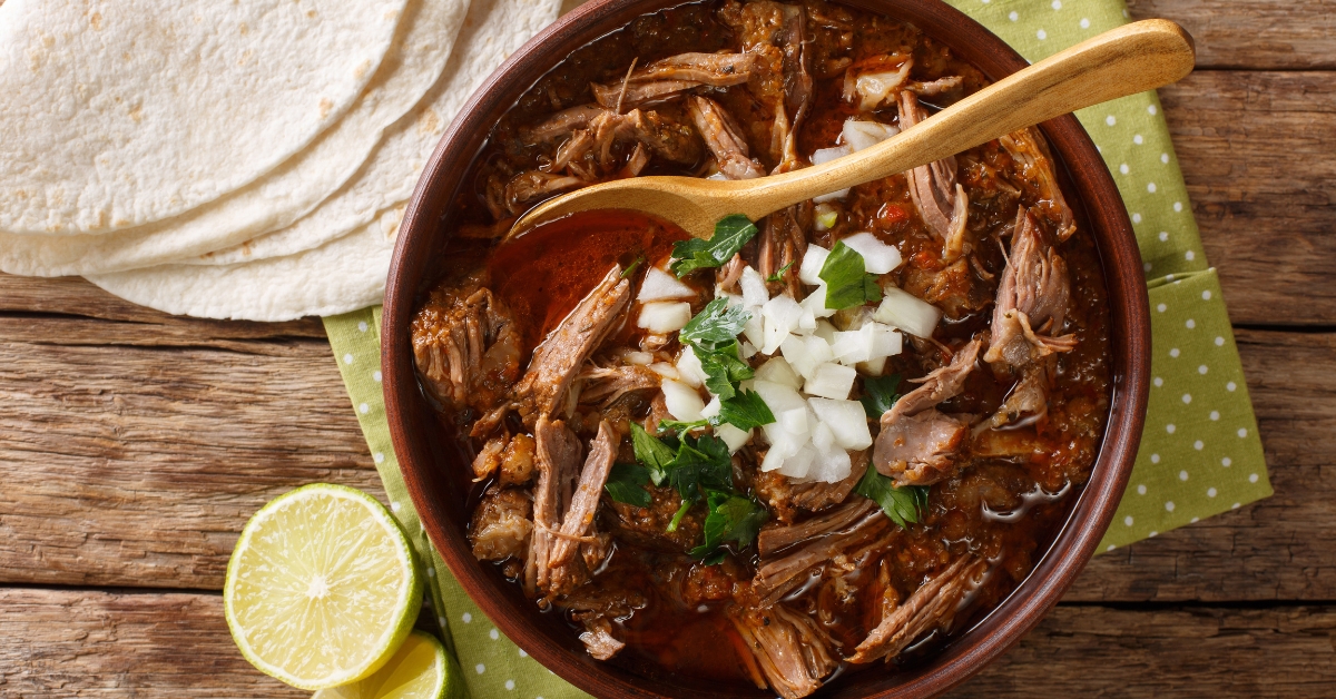 Bowl of Homemade Spicy Biria with Goat Meat, Radish and Herbs