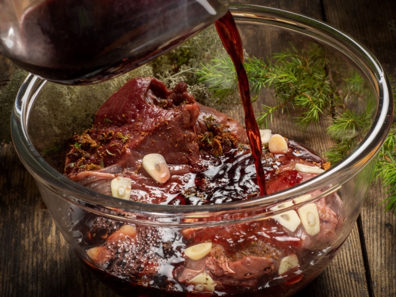 Pork Chops Marinated on a Clear Bowl