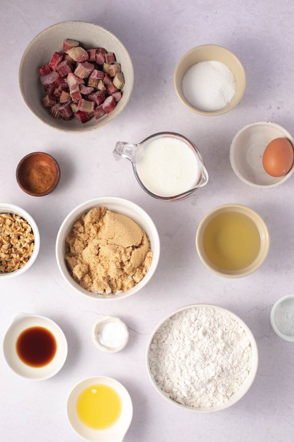 Rhubarb Muffin Ingredients - Rhubarb, Flour, Brown Sugar, Baking Powder, Salt, Buttermilk, Vegetable Oil, Egg, Vanilla Extract and Cinnamon