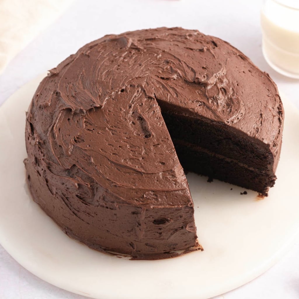 Chocolate frosting covered layered cake.