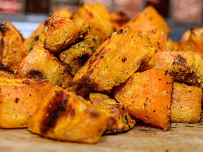 Baked Sweet Potatoes in a Wooden Cutting Board