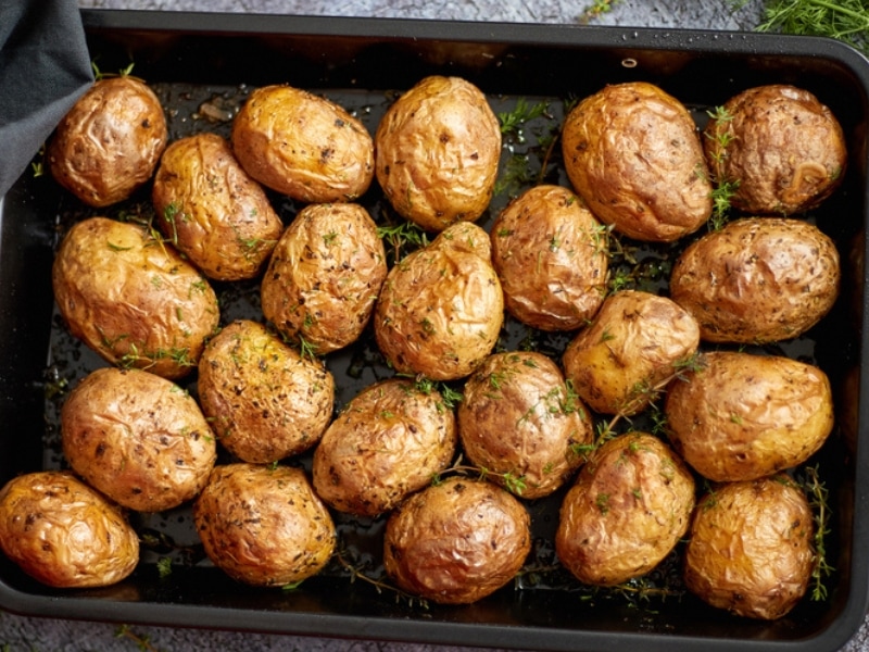 Seasoned Baked Potatoes in a Baking Pan