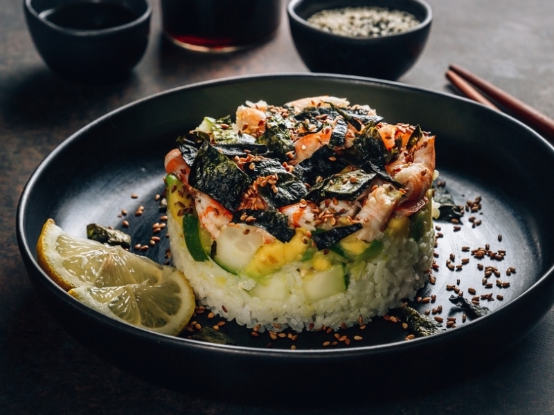 Layered Sushi Garnished With Furikake Seasoning
