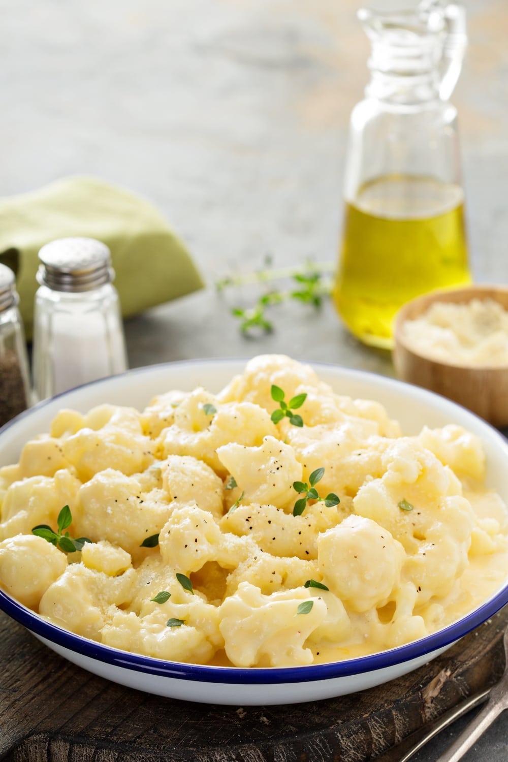 Cheesy Microwave Steamed Broccoli with Herbs and Seasonings in a Bowl