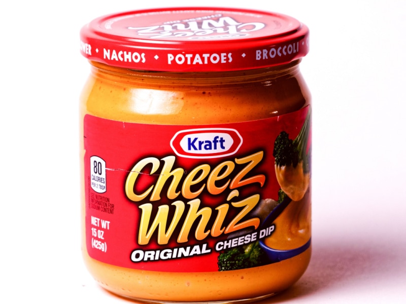 A Bottle of Cheez Whiz on White Background