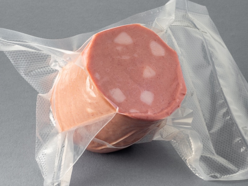 Block of Mortadella Vacuum-Sealed in a Bag