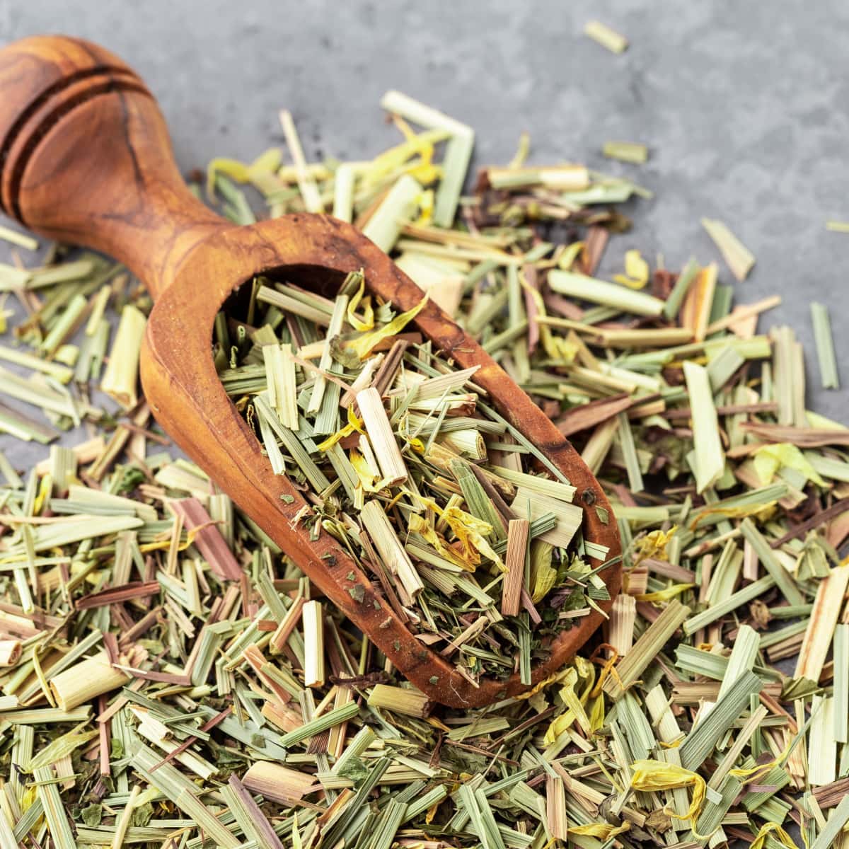 Dried Lemongrass on a Table with Wooden Scooper