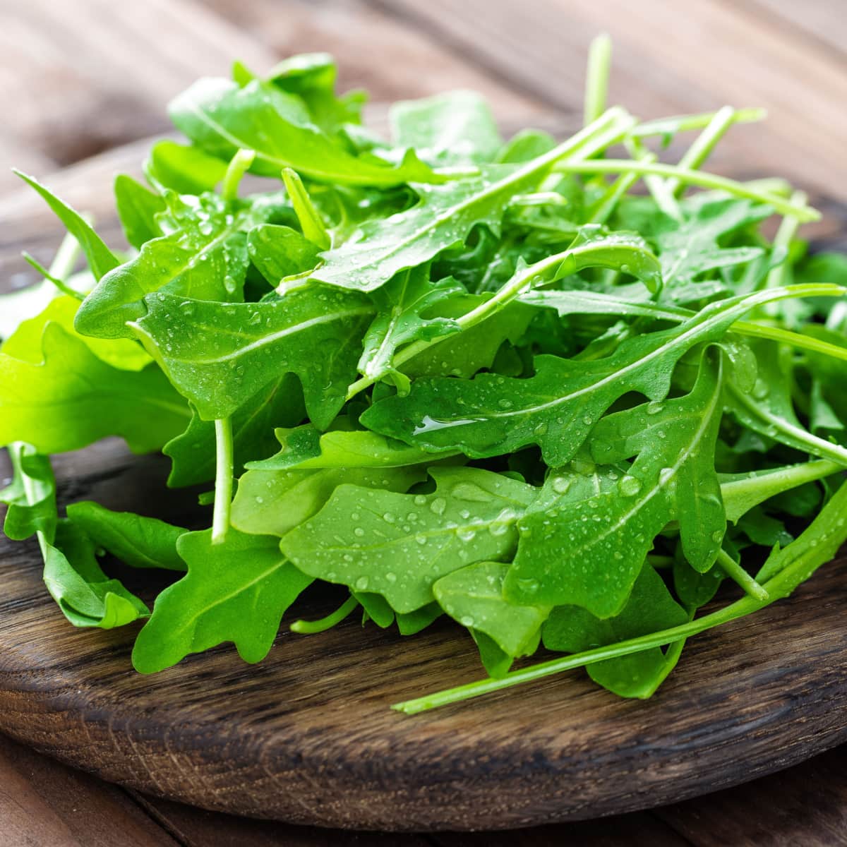 Fresh Arugula on a Wooden Table