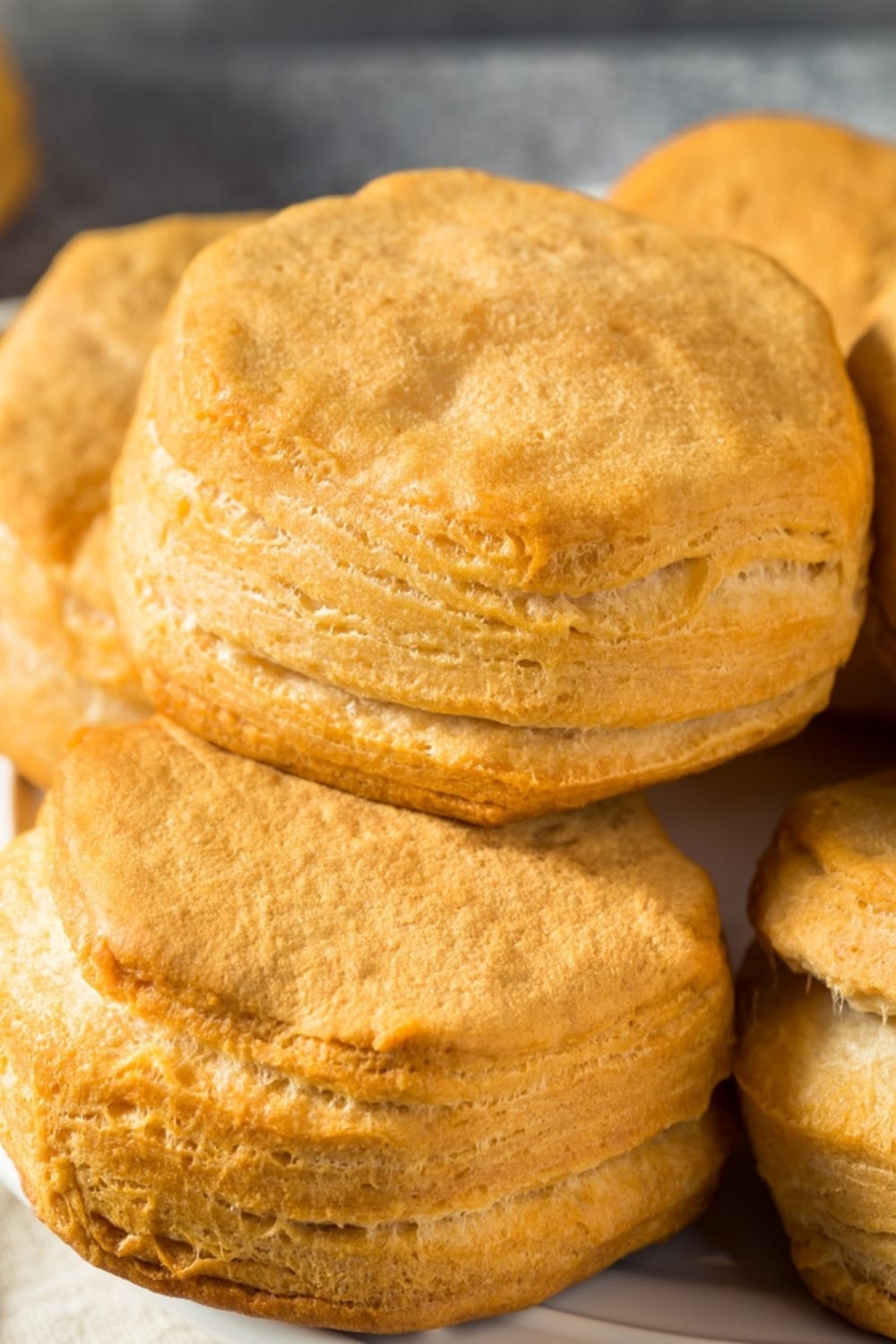 Closeup view of stacked Honey Butter Biscuits