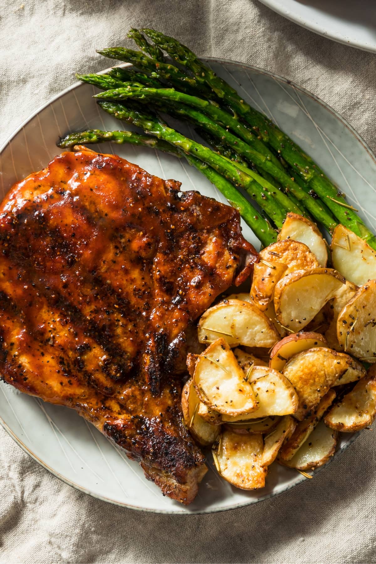 Homemade Honey Garlic Pork Chops with Asparagus and Mashed Potatoes