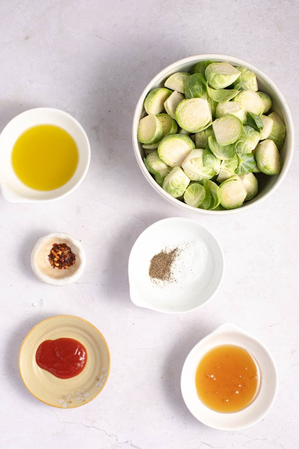 Honey Sriracha Brussels Sprouts Ingredients - Brussels Sprouts, Olive Oil, Red Pepper Flakes, Honey, Sriracha Sauce, Salt and Pepper