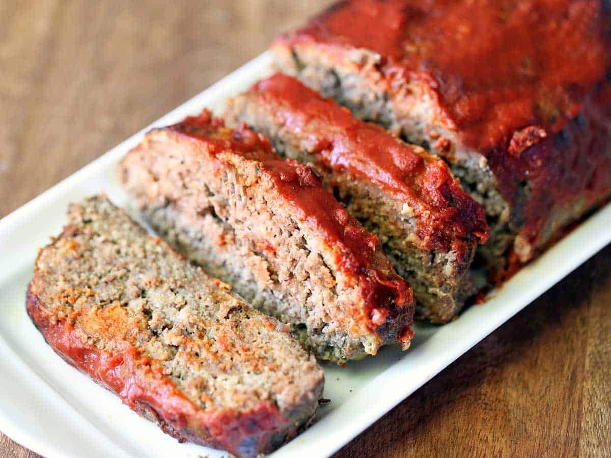 Sliced meatloaf on  pan. 