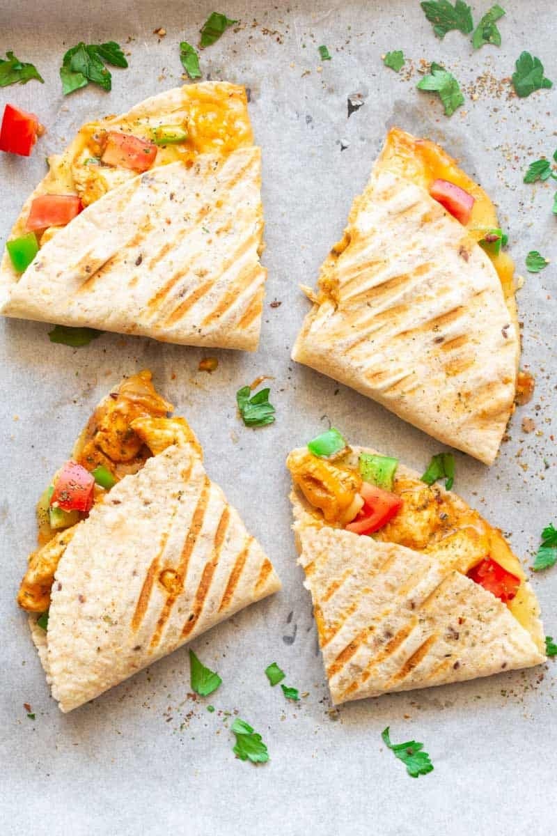 Keto Quesadillas slices on a concrete surface. 