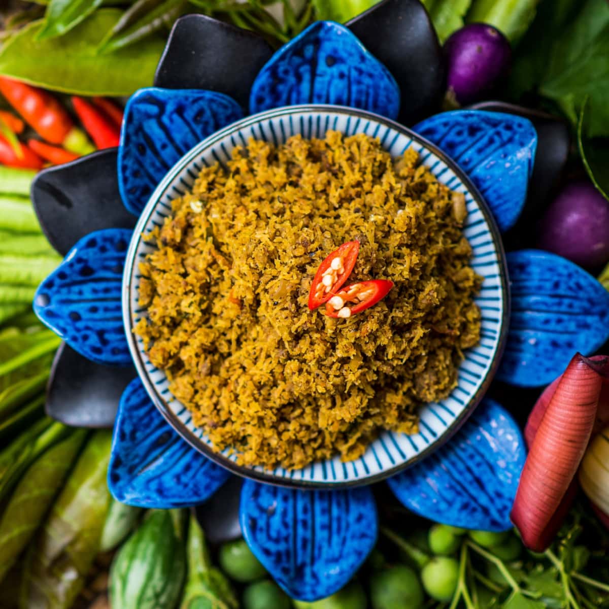 Lemongrass Paste on a Plate with Mixed Vegetables on a Wooden Table