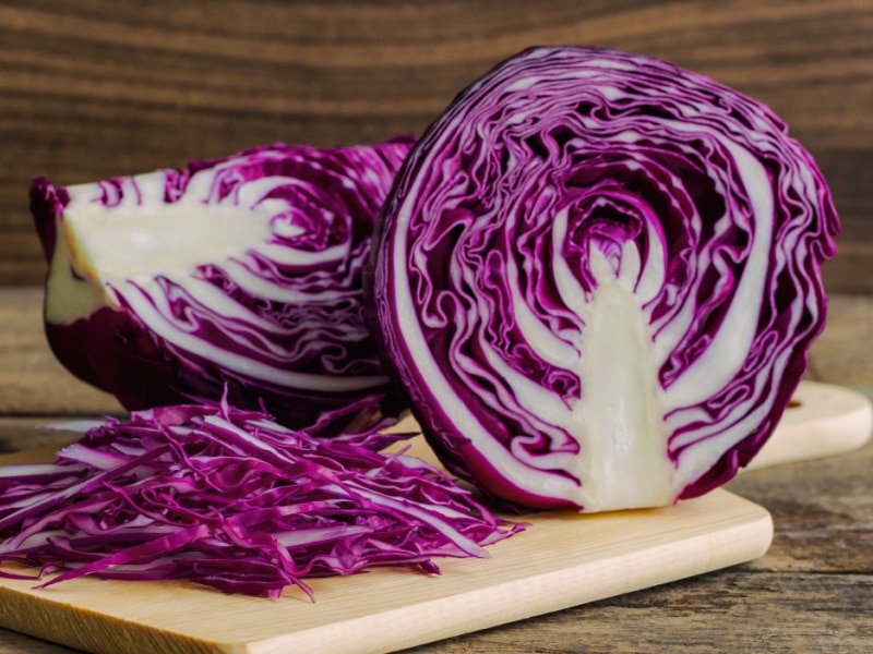 Chopped Red Cabbage on a Wooden Cutting Board Ready to Cook