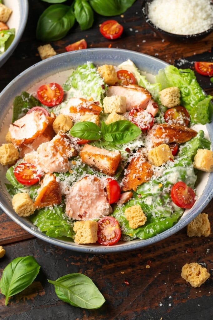 Salmon Caesar Salad with Croutons and Cherry Tomatoes