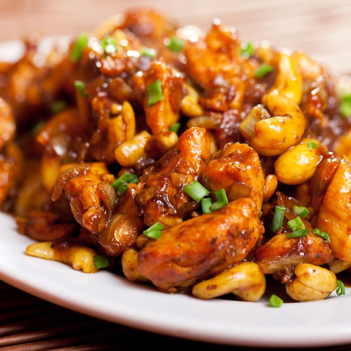 Saucy Cashew Chicken in a White Plate