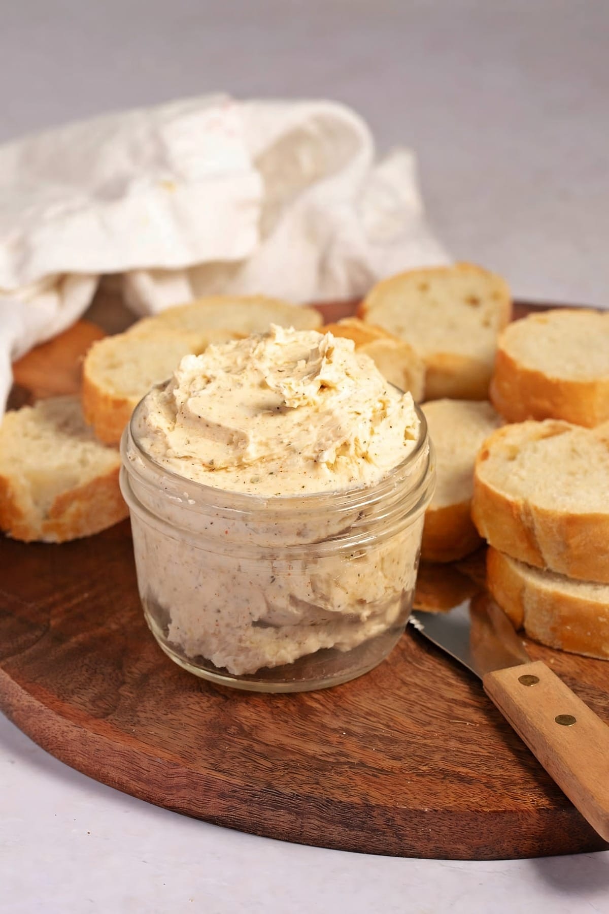 Garlic Butter in a Jar with Garlic Bread