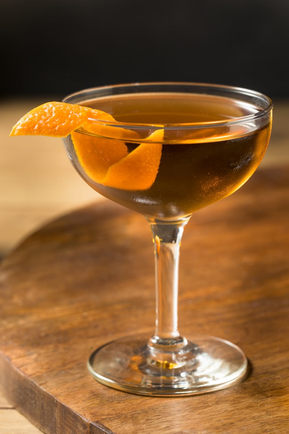 Glass of Hanky Panky Cocktail Garnished With Orange peel