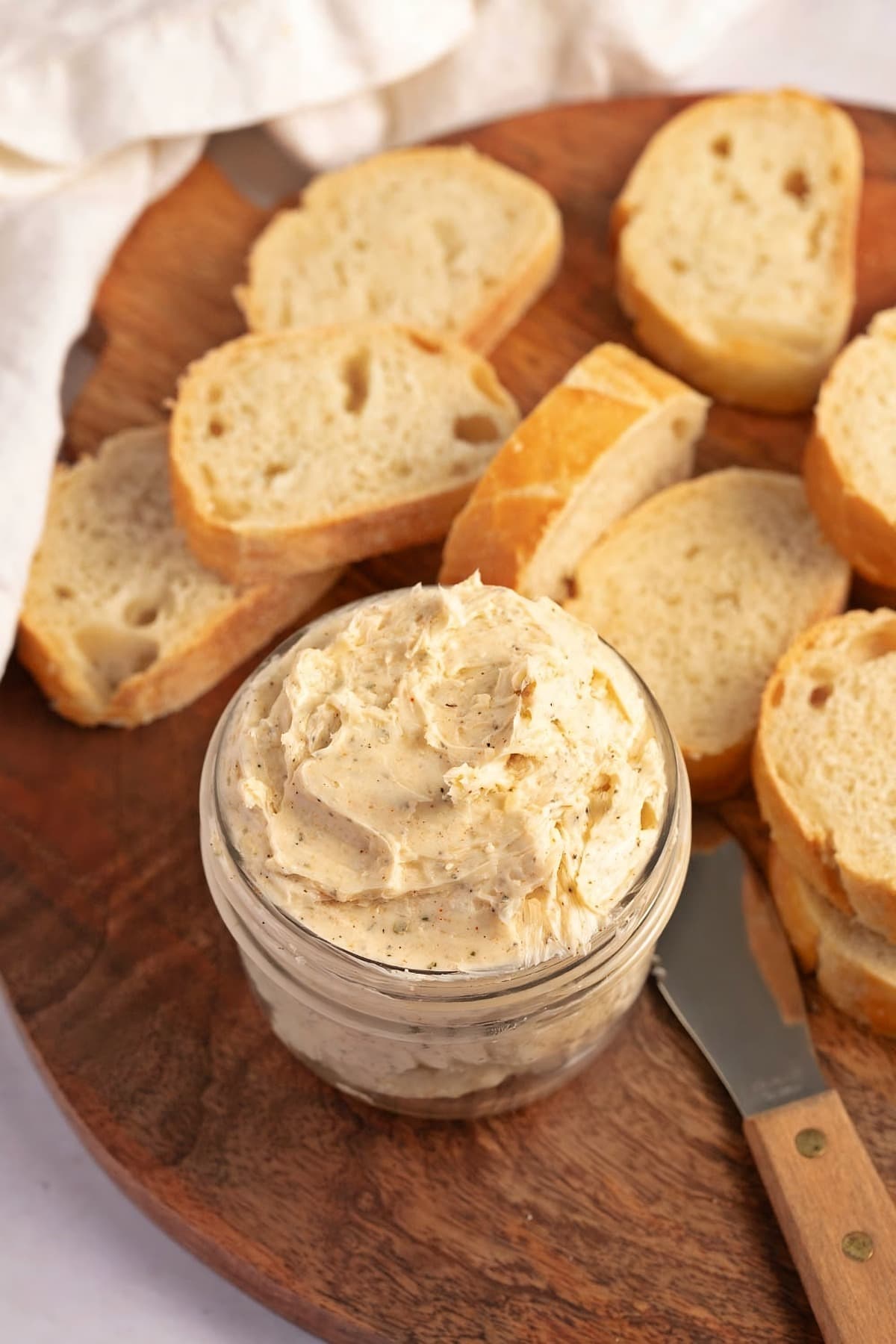 Homemade Garlic Butter with Garlic Bread in a Wooden Board