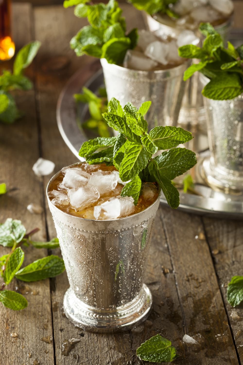 Boozy Mint Julep Garnished With Fresh Mints
