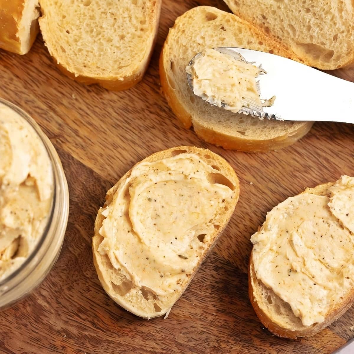 Spreading Garlic Butter into Garlic Bread