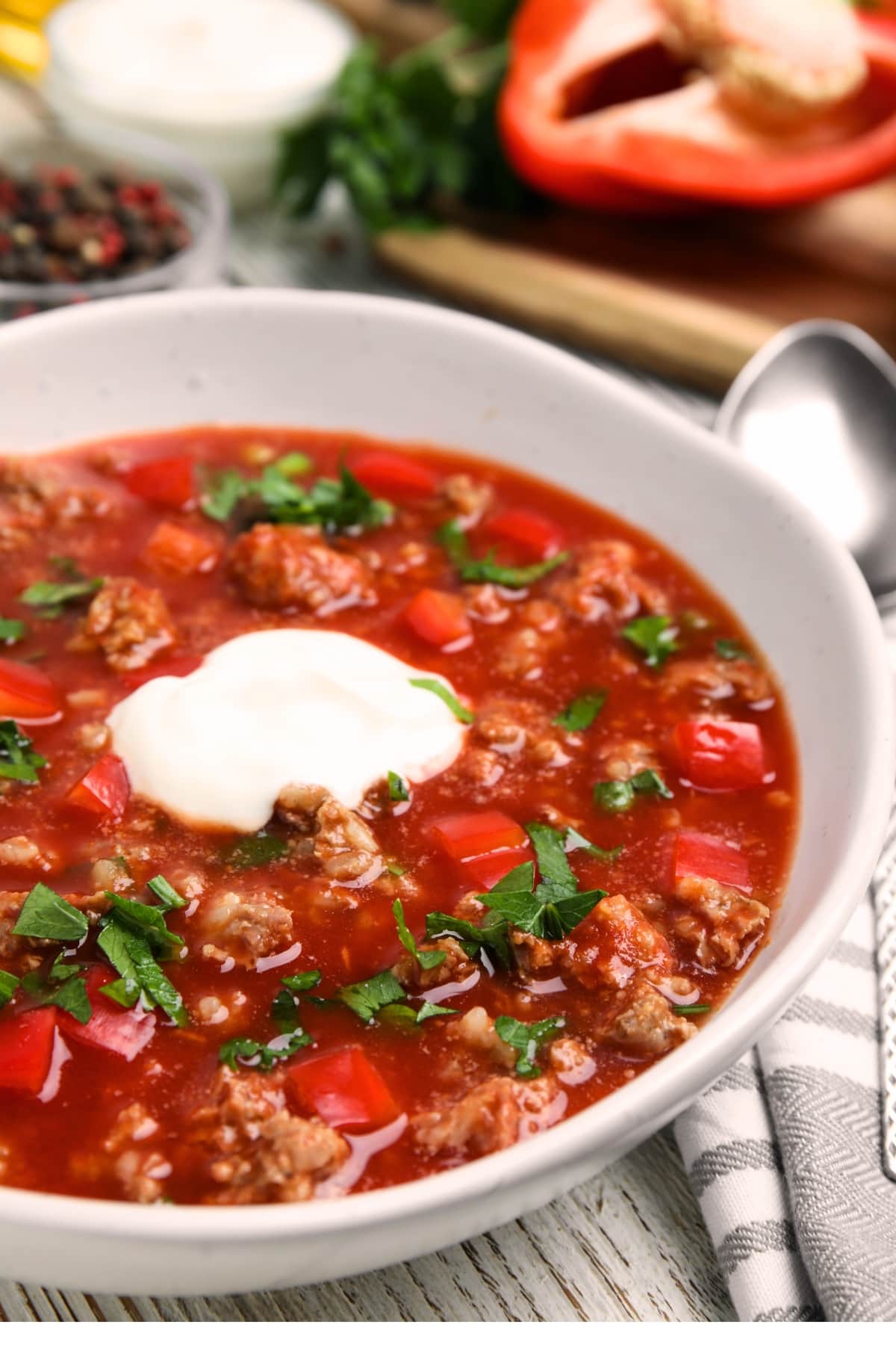 Stuffed Pepper Soup on a Bowl Topped With Sour Cream