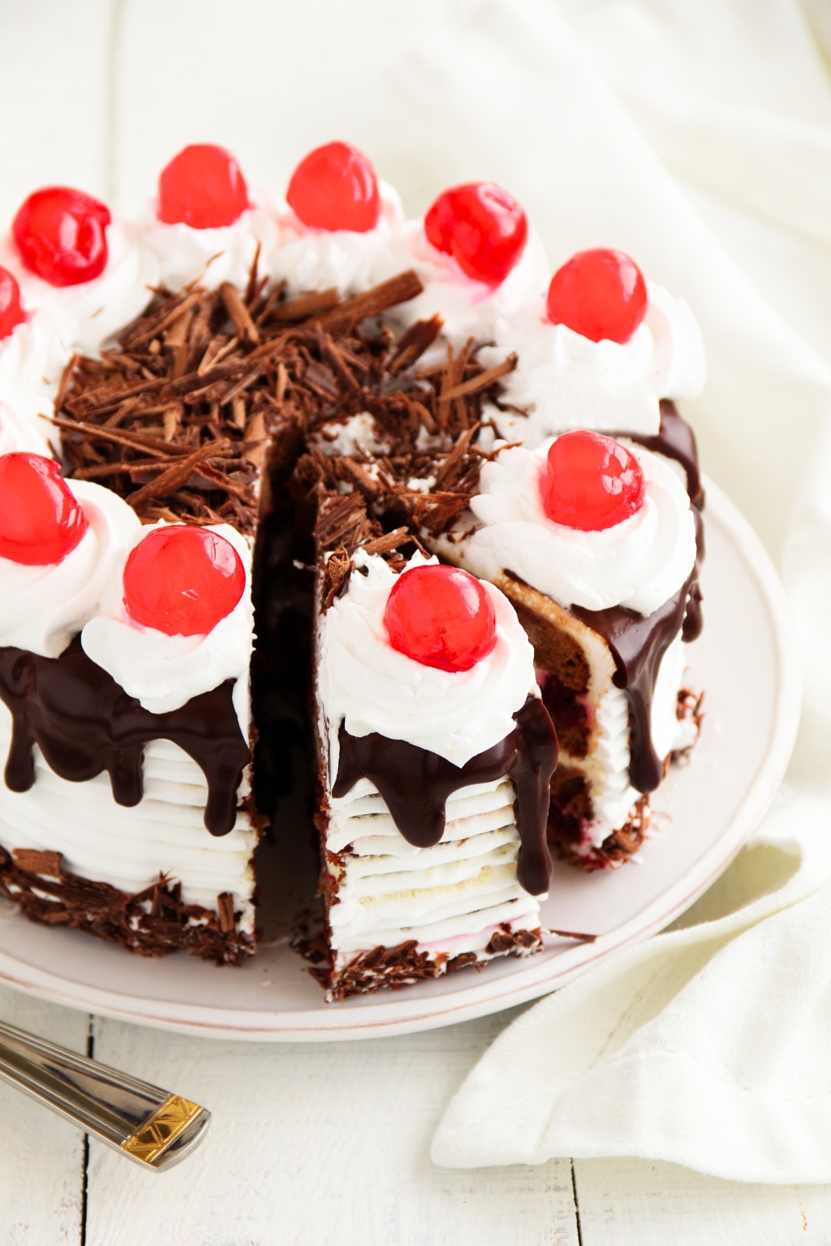 30 Best Cake Flavors To Try (+ Easy Recipes) featuring Sweet Homemade Black Forest Cake with Fresh Cherries
