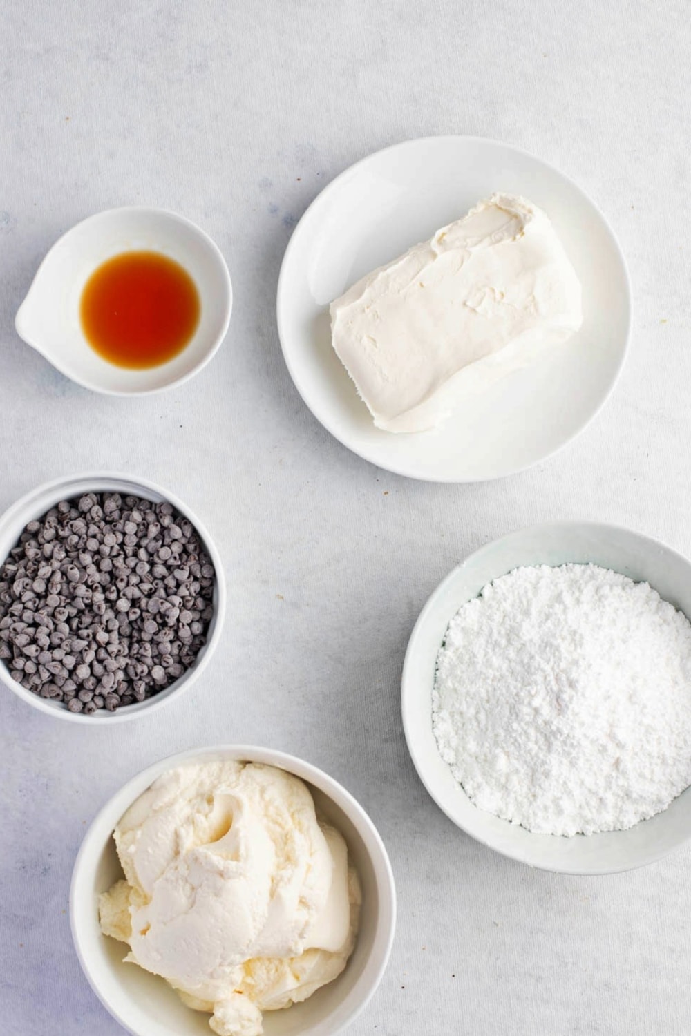 Cannoli Dip Ingredients on a White Marble Surface