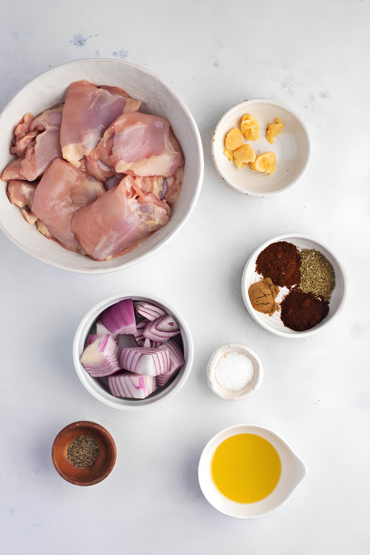 Chipotle Chicken Ingredients - Dried Chipotle Chile, Water, Red Onion, Garlic, Sea Salt, Ground Cumin, Dried Oregano, Ground Black Pepper, Olive Oil, Boneless Chicken Thighs
