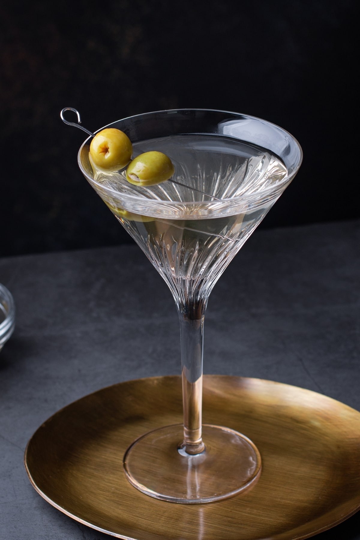 Dirty Martini in a Martini Glass Garnished With Olives