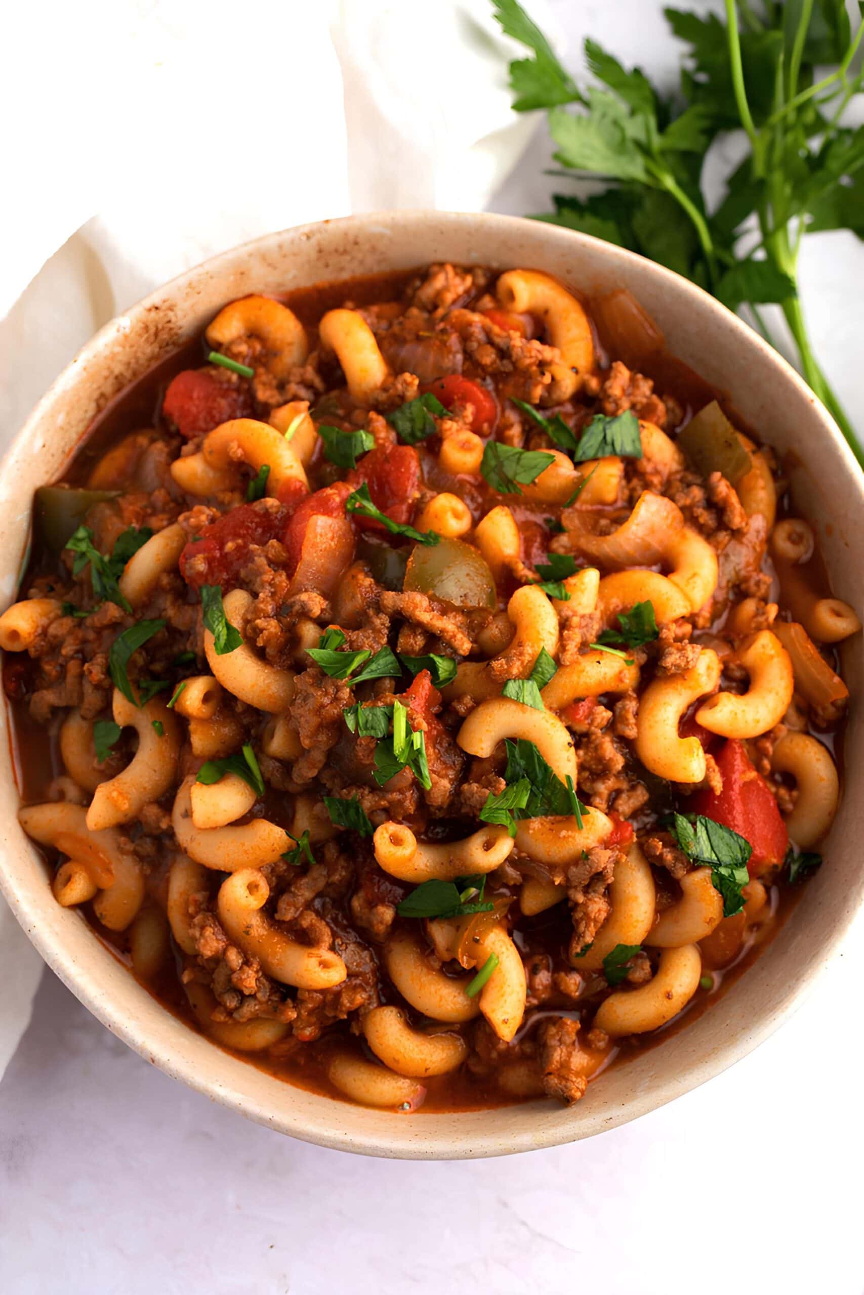 American Goulash in a Bowl with Tomatoes, Herbs and Ground Beef