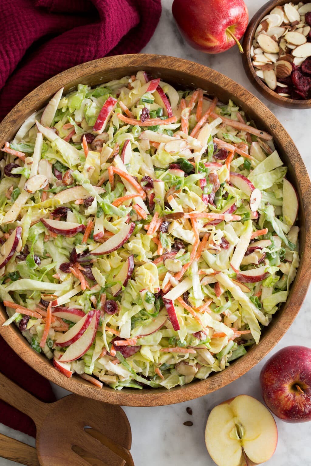 Apple Cranberry Coleslaw on a wooden bowl 