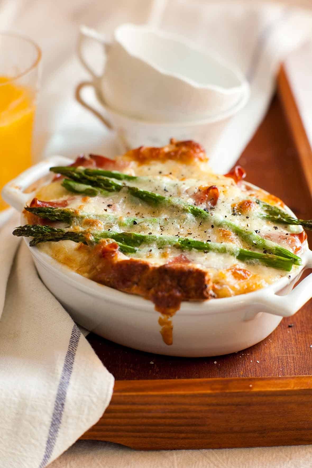 Asparagus, Egg, and Cheese Strata on an oval casserole