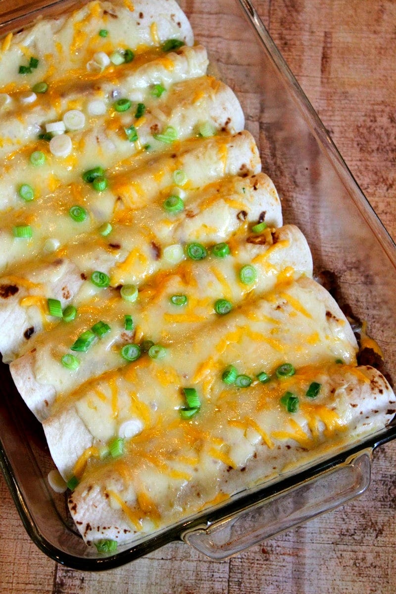 Beef burrito casserole on a glass baking dish. 