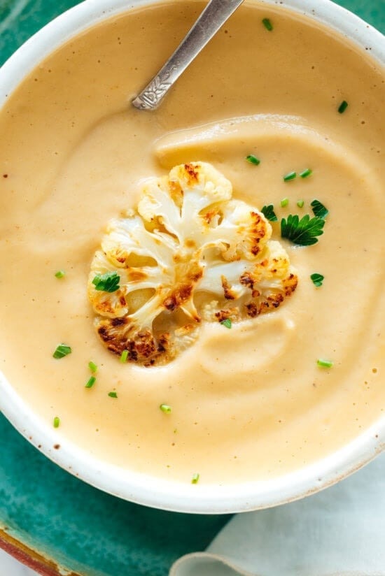Creamy Roasted Cauliflower Soup in a Bowl with Green Onions