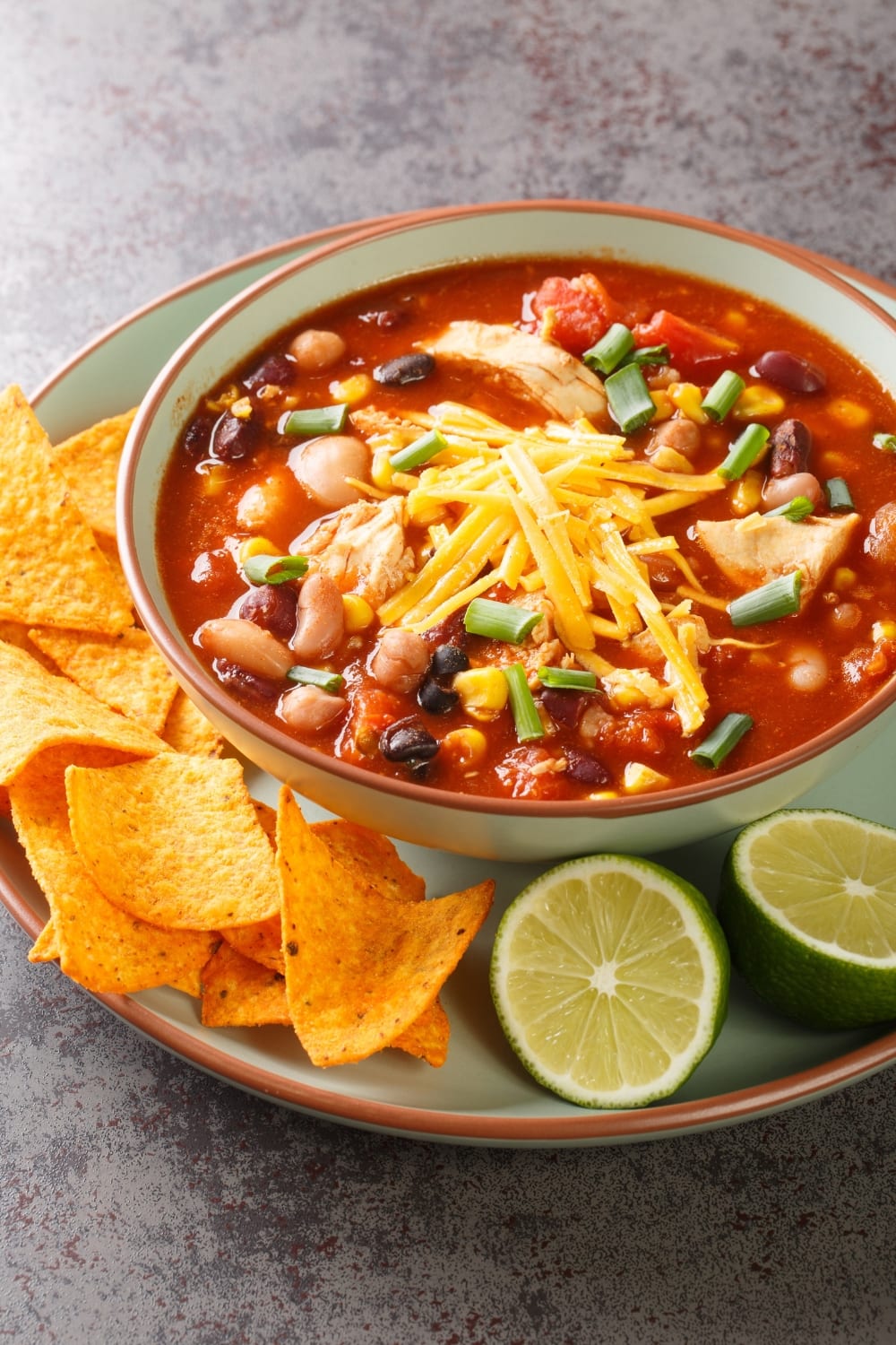 Bowl of Chick-fil-A Chicken Tortilla Soup with cheese on top. 