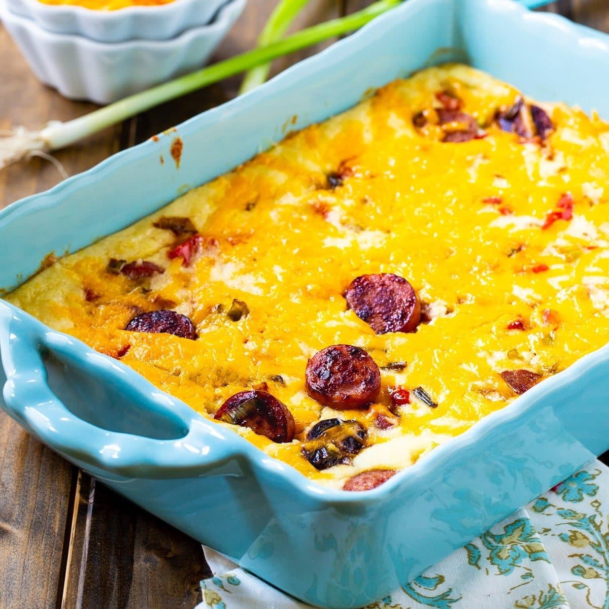 Cheesy Grits Casserole with Smoked Sausage loaded with grits, eggs, parmesan cheese, and cheddar cheese