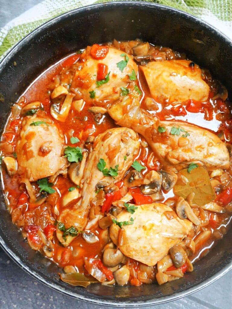 A delicious stew made with chicken and mushrooms, cooked to perfection in a skillet