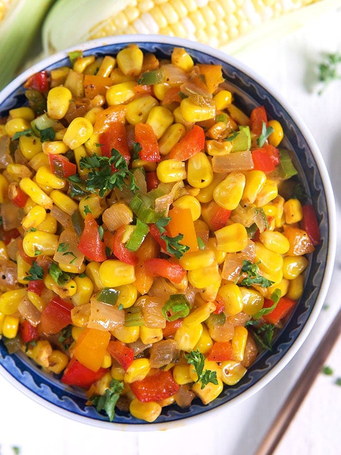 Bowl of cajun corn mache choux. 