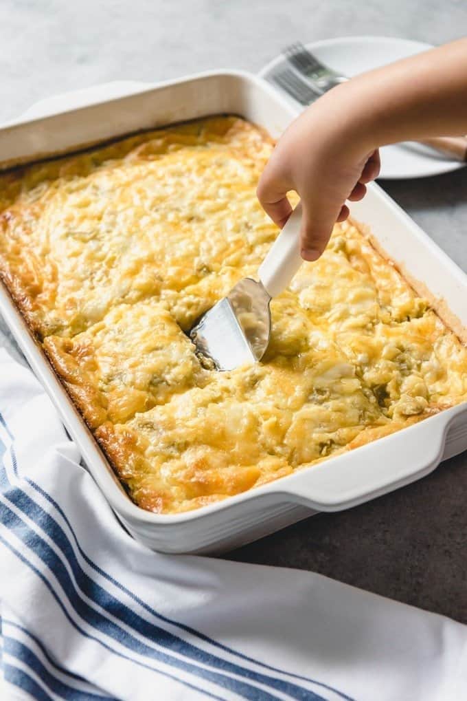 Ladle scooping on Green Chili Egg Casserole