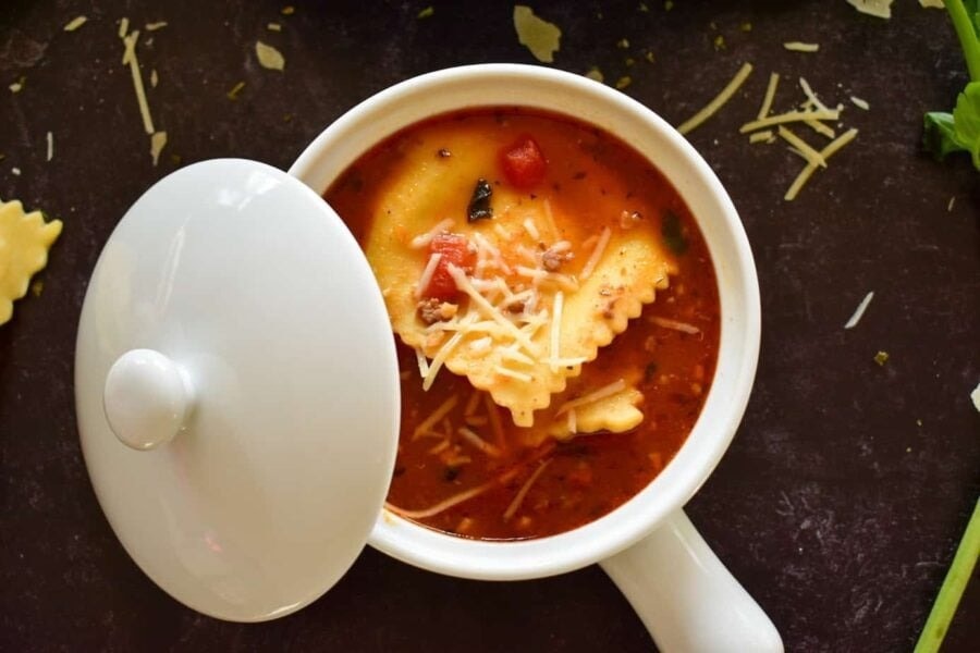 Homemade Instant Pot Ravioli Soup with ground pork sausage, lean ground beef, pasta sauce and parmesan cheese