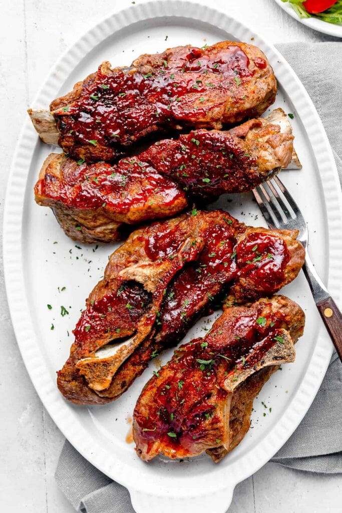 Ribs cooked in Instant Pot served in white plate. 