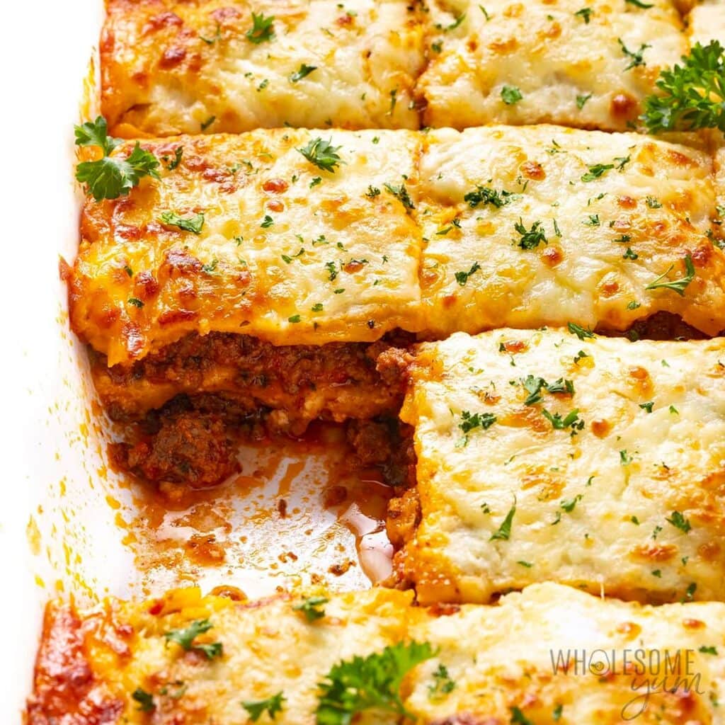 Sliced lasagna in a casserole dish. 