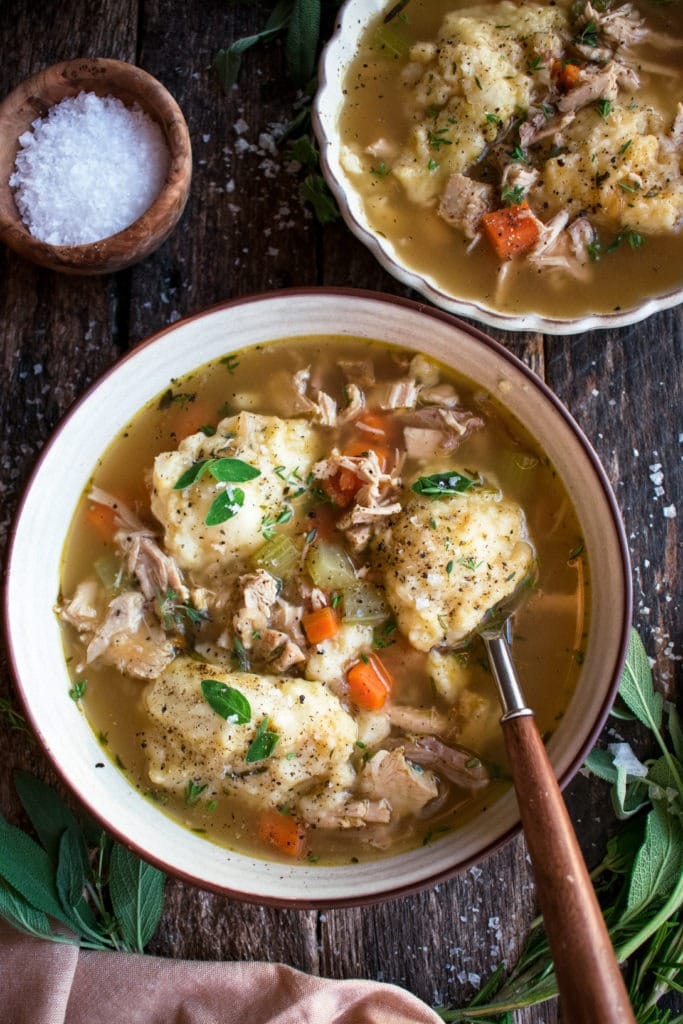 Two bowls of leftover roast turkey soup. 